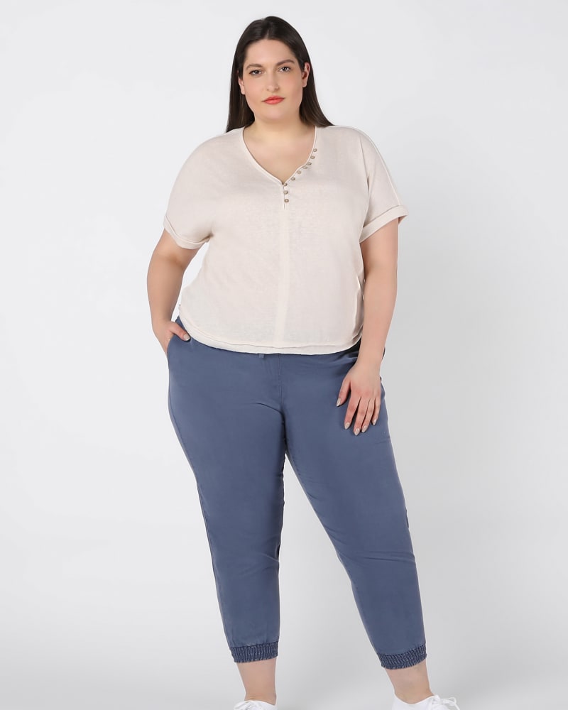 Front of a model wearing a size 0X Faye Tencel Jogger in Dusty Blue by DEX PLUS. | dia_product_style_image_id:234082